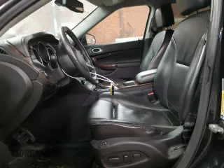 2011 Saab 9-4X z VIN 3G0FNREY1BS800412, wystawiony jako Copart lot #47351285 z przebiegiem 153 928 mil mil oraz Szkoda całkowita • Salvage title. Historia ofert i sprzedaży dostępna na DreamBid. Obrazek 7.