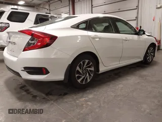 2018 Honda Civic EX with VIN 19XFC2F74JE005647, listed as a IAAI auction lot 41938607 with 90,263 mi miles and . Bid and sale history available at DreamBid. Image 4.