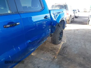 2023 Chevrolet Silverado 1500 LT Trail Boss with VIN 3GCUDFED9PG117005, listed as a IAAI auction lot 41505108 with 14,575 mi miles and . Bid and sale history available at DreamBid. Image 6.