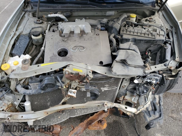 2004 Infiniti I35 z VIN JNKDA31A84T204460, wystawiony jako Copart lot #78439394 z przebiegiem 197 201 mil mil oraz Szkoda całkowita • Salvage title. Historia ofert i sprzedaży dostępna na DreamBid. Obrazek 13.