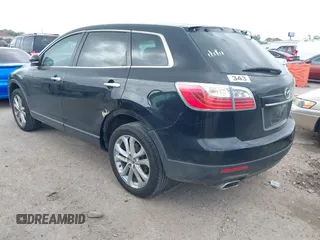 2011 Mazda CX-9 Grand Touring with VIN JM3TB2DA7B0304023, listed as a IAAI auction lot 41950829 with 135,858 mi miles. Bid and sale history available at carsss.com. Image 3.