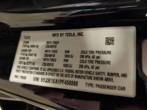 2023 Tesla Model 3 with VIN 5YJ3E1EA1PF458888, listed as a IAAI auction lot 41730104 with 82,995 mi miles. Bid and sale history available at carsss.com. Image 9.