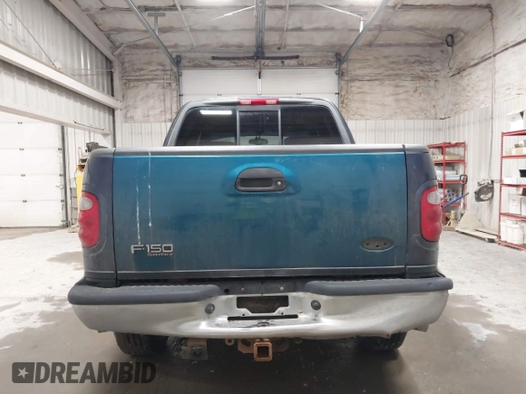 2003 Ford F-150 XLT z VIN 1FTRW08L73KC11631, wystawiony jako IAAI lot #42673130 z przebiegiem 188 945 mil mil oraz . Historia ofert i sprzedaży dostępna na DreamBid. Obrazek 16.