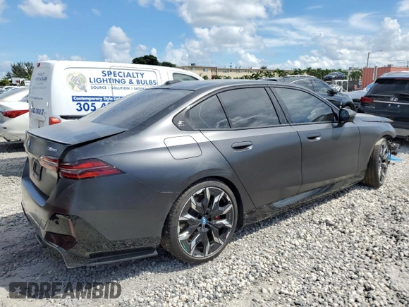 2024 BMW i5 M60 with VIN WBY43FK00RCR71826, listed as a Copart auction lot 72140144 with 5,987 mi miles and Salvage Title. Bid and sale history available at carsss.com. Image 3.
