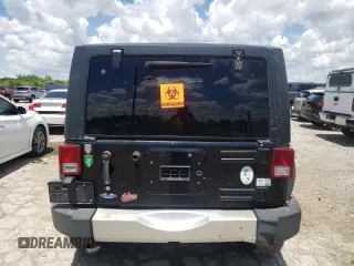 2011 Jeep Wrangler Sahara with VIN 1J4AA5D11BL528191, listed as a Copart auction lot 63252155 with 171,169 mi miles and Clean title. Bid and sale history available at DreamBid. Image 6.