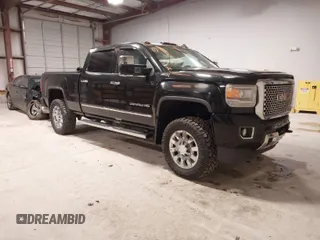 2015 GMC Sierra 2500HD available WiFi Denali with VIN 1GT120E89FF117773, listed as a IAAI auction lot 41587823 with 251,371 mi miles. Bid and sale history available at carsss.com. Image 1.