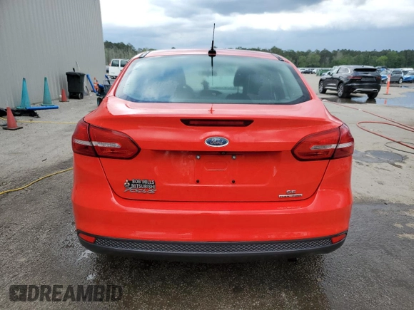2016 Ford Focus SE z VIN 1FADP3F26GL363912, wystawiony jako Copart lot #54059175 z przebiegiem 166 827 mil mil oraz Szkoda całkowita • Salvage title. Historia ofert i sprzedaży dostępna na DreamBid. Obrazek 6.
