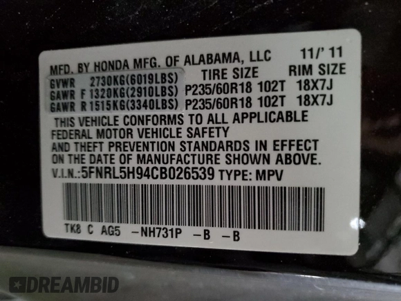 2012 Honda Odyssey Touring with VIN 5FNRL5H94CB026539, listed as a Copart auction lot 48925605 with 88,381 mi miles and Salvage Title. Bid and sale history available at DreamBid. Image 14.