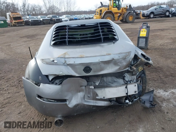 2003 Nissan 350Z Touring z VIN JN1AZ34E33T003711, wystawiony jako IAAI lot #41351191 z przebiegiem 167 503 mil mil oraz . Historia ofert i sprzedaży dostępna na DreamBid. Obrazek 16.