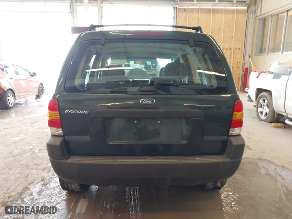 2003 Ford Escape XLS Popular with VIN 1FMYU02143KC35891, listed as a IAAI auction lot 41599760 with 148,381 mi miles. Bid and sale history available at carsss.com. Image 17.