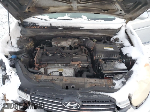 2007 Hyundai Accent GL z VIN KMHCN45CX7U127037, wystawiony jako Copart lot #86041984 z przebiegiem 212 828 mil mil oraz Szkoda całkowita • Salvage title. Historia ofert i sprzedaży dostępna na DreamBid. Obrazek 11.
