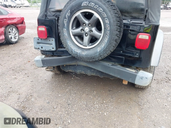 2004 Jeep Wrangler X z VIN 1J4FA39SX4P730504, wystawiony jako IAAI lot #42342491 z przebiegiem 112 942 mil mil oraz . Historia ofert i sprzedaży dostępna na DreamBid. Obrazek 6.