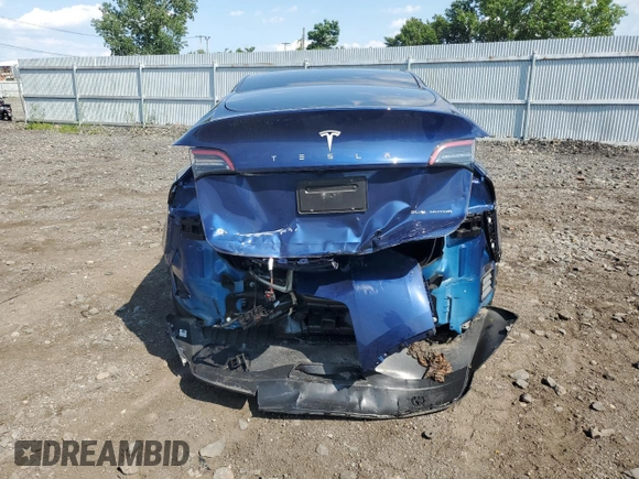 2024 Tesla Model Y Long Range with VIN 7SAYGAEEXRF983702, listed as a Copart auction lot 61536565 with Not provided miles and Salvage title. Bid and sale history available at DreamBid. Image 6.