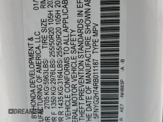 2024 Honda Pilot Touring z VIN 5FNYG2H74RB011187, wystawiony jako Copart lot #79999324 z przebiegiem 16 123 mil mil oraz Szkoda całkowita • Salvage title. Historia ofert i sprzedaży dostępna na DreamBid. Obrazek 13.