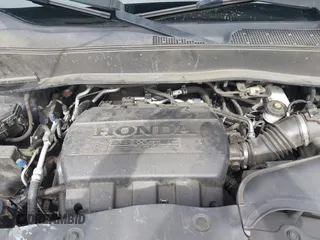 2015 Honda Pilot Touring with VIN 5FNYF3H91FB011847, listed as a IAAI auction lot 41841293 with 99,431 mi miles. Bid and sale history available at carsss.com. Image 10.