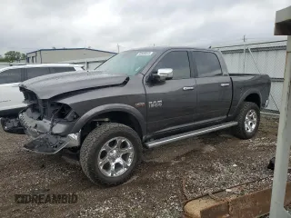 2017 Ram 1500 Laramie with VIN 1C6RR7NTXHS833109, listed as a Copart auction lot 56585645 with 103,015 mi miles and Salvage title. Bid and sale history available at DreamBid. Image 1.