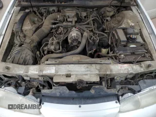 1996 Ford Thunderbird LX with VIN 1FALP62W0TH162431, listed as a Copart auction lot 41864445 with 183,798 mi miles and Salvage Title. Bid and sale history available at DreamBid. Image 11.