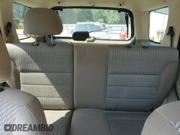 2004 Ford Escape XLT with VIN 1FMCU03134KB53192, listed as a Copart auction lot 62178075 with 223,637 mi miles and Salvage title. Bid and sale history available at DreamBid. Image 10.