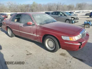 2000 Mercury Grand Marquis LS z VIN 2MEFM75W9YX641907, wystawiony jako Copart lot #50722975 z przebiegiem 152 108 mil mil oraz Szkody całkowita. Historia ofert i sprzedaży dostępna na DreamBid. Obrazek 4.