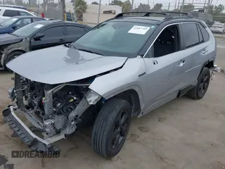 2021 Toyota RAV4 Hybrid XSE z VIN 4T3E6RFV9MU027713, wystawiony jako IAAI lot #42587759 z przebiegiem 28 806 mil mil oraz . Historia ofert i sprzedaży dostępna na DreamBid. Obrazek 2.