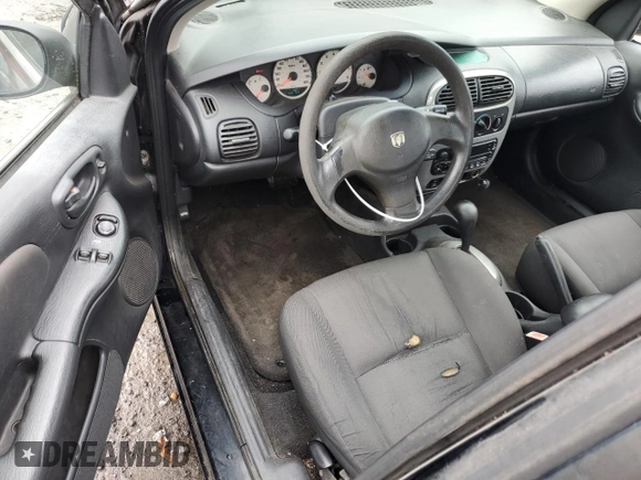 2004 Dodge Neon SXT z VIN 1B3ES56C34D639617, wystawiony jako Copart lot #73036524 z przebiegiem 126 165 mil mil oraz Czysty tytuł • Clean title. Historia ofert i sprzedaży dostępna na DreamBid. Obrazek 8.
