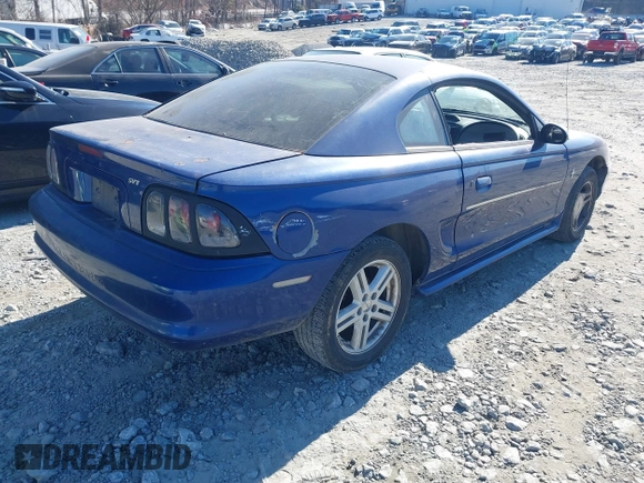 1996 Ford Mustang with VIN 1FALP4042TF140884, listed as a IAAI auction lot 41279611 with 233,047 mi miles. Bid and sale history available at carsss.com. Image 4.
