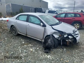 2011 Toyota Corolla L with VIN 2T1BU4EE0BC609090, listed as a Copart auction lot 52022585 with Not Provided miles and Salvage Title. Bid and sale history available at carsss.com. Image 4.