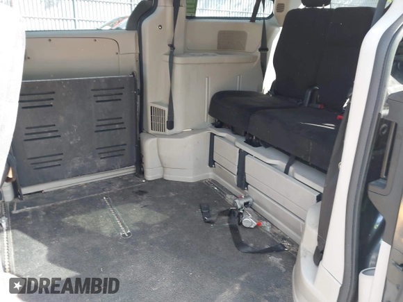 2013 Dodge Grand Caravan SXT with VIN 2C4RDGCG4DR636798, listed as a IAAI auction lot 42240550 with 96,100 mi miles and . Bid and sale history available at DreamBid. Image 8.