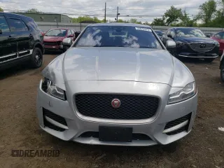 2017 Jaguar XF with VIN SAJBL4BN6HCY44054, listed as a Copart auction lot 55842675 with 124,273 mi miles and Salvage Title. Bid and sale history available at DreamBid. Image 5.