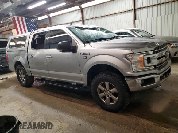 2020 Ford F-150 XL with VIN 1FTEW1E57LKF44499, listed as a Copart auction lot 60336735 with 156,745 mi miles and Salvage title. Bid and sale history available at DreamBid. Image 4.