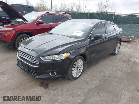 2016 Ford Fusion Energi SE Luxury with VIN 3FA6P0PU2GR322430, listed as a IAAI auction lot 42038508 with 114,980 mi miles. Bid and sale history available at carsss.com. Image 2.