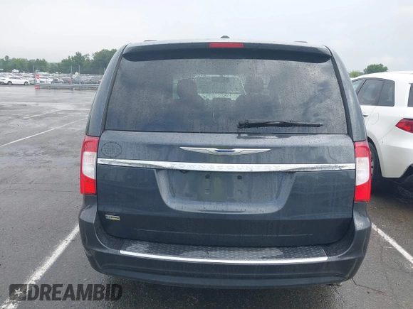 2014 Chrysler Town & Country Touring z VIN 2C4RC1BG4ER439889, wystawiony jako IAAI lot #39977311 z przebiegiem 155 656 mil mil oraz . Historia ofert i sprzedaży dostępna na DreamBid. Obrazek 16.