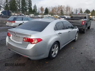 2012 Acura TSX Tech Pkg with VIN JH4CU2F62CC012290, listed as a IAAI auction lot 40765338 with 129,737 mi miles. Bid and sale history available at carsss.com. Image 4.