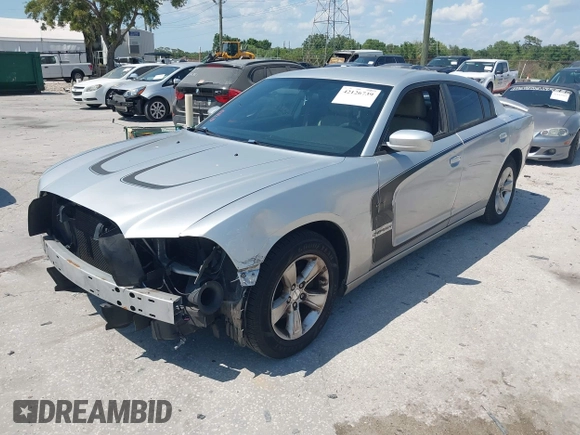 2012 Dodge Charger SE with VIN 2C3CDXBG5CH119493, listed as a IAAI auction lot 42126739 with 138,464 mi miles and . Bid and sale history available at carsss.com. Image 2.