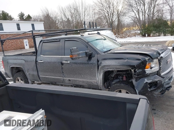2016 GMC Sierra 2500HD Denali z VIN 1GT12UE81GF128498, wystawiony jako IAAI lot #41346398 z przebiegiem 164 532 mil mil oraz . Historia ofert i sprzedaży dostępna na DreamBid. Obrazek 13.