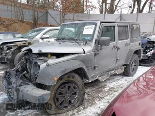 2014 Jeep Wrangler Unlimited Sport with VIN 1C4HJWDG1EL302087, listed as a IAAI auction lot 41420740 with 152,096 mi miles. Bid and sale history available at carsss.com. Image 23.