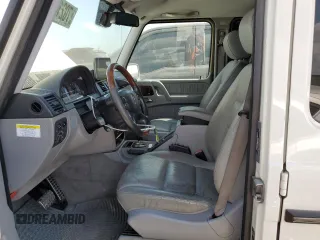 2008 Mercedes-Benz G-Class 5.0L with VIN WDCYR49E58X173606, listed as a Copart auction lot 70216394 with 0 mi miles and Salvage Title. Bid and sale history available at carsss.com. Image 7.
