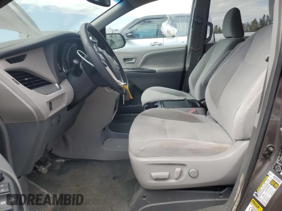 2015 Toyota Sienna LE with VIN 5TDJK3DC7FS121635, listed as a Copart auction lot 55999945 with 139,642 mi miles and Salvage title. Bid and sale history available at DreamBid. Image 7.