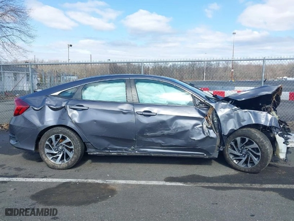 2016 Honda Civic Sedan EX with VIN 2HGFC2F72GH509547, listed as a IAAI auction lot 41744276 with 124,084 mi miles. Bid and sale history available at carsss.com. Image 13.