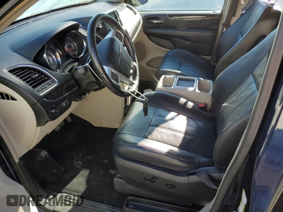 2014 Chrysler Town & Country Touring with VIN 2C4RC1BG2ER256457, listed as a Copart auction lot 70687244 with 179,893 mi miles and Salvage Title. Bid and sale history available at DreamBid. Image 7.