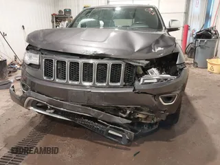 2015 Jeep Grand Cherokee Overland z VIN 1C4RJFCG1FC663469, wystawiony jako IAAI lot #41666113 z przebiegiem 140 159 mil mil oraz . Historia ofert i sprzedaży dostępna na DreamBid. Obrazek 6.