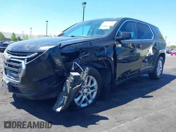 2019 Chevrolet Traverse LS z VIN 1GNERFKW3KJ222388, wystawiony jako IAAI lot #42225444 z przebiegiem 94 777 mil mil oraz . Historia ofert i sprzedaży dostępna na DreamBid. Obrazek 6.