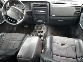 1999 Jeep Cherokee Sport with VIN 1J4FF68S4XL567848, listed as a Copart auction lot 43222045 with 280,178 mi miles and Salvage title. Bid and sale history available at DreamBid. Image 8.