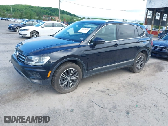 2018 Volkswagen Tiguan SEL z VIN 3VV2B7AXXJM145781, wystawiony jako IAAI lot #42273176 z przebiegiem 86 610 mil mil oraz . Historia ofert i sprzedaży dostępna na DreamBid. Obrazek 18.