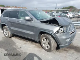 2012 Jeep Grand Cherokee Laredo with VIN 1C4RJFAG8CC298268, listed as a IAAI auction lot 40787833 with 206,486 mi miles. Bid and sale history available at carsss.com. Image 1.