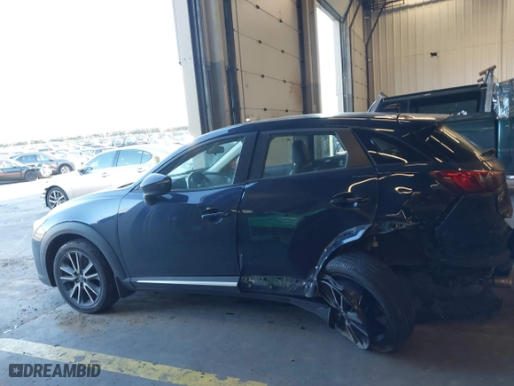 2018 Mazda CX-3 Grand Touring with VIN JM1DKFD77J0300612, listed as a IAAI auction lot 41322923 with 49,830 mi miles. Bid and sale history available at carsss.com. Image 14.