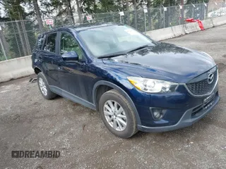 2015 Mazda CX-5 Touring with VIN JM3KE4CY5F0453646, listed as a IAAI auction lot 41740574 with 91,167 mi miles. Bid and sale history available at carsss.com. Image 1.
