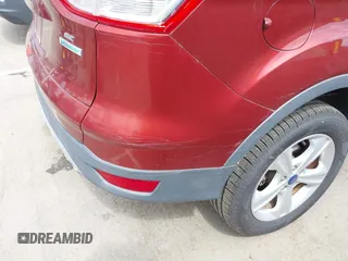 2014 Ford Escape SE with VIN 1FMCU0GX4EUD02407, listed as a IAAI auction lot 42156731 with 114,117 mi miles. Bid and sale history available at carsss.com. Image 6.