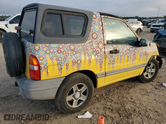 2003 Chevrolet Tracker z VIN 2CNBE18C136928311, wystawiony jako Copart lot #84463154 z przebiegiem 118 195 mil mil oraz Szkoda całkowita • Salvage title. Historia ofert i sprzedaży dostępna na DreamBid. Obrazek 3.