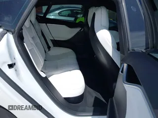 2018 Tesla Model S 75D with VIN 5YJSA1E25JF245269, listed as a IAAI auction lot 41914567 with 56,086 mi miles and . Bid and sale history available at DreamBid. Image 8.